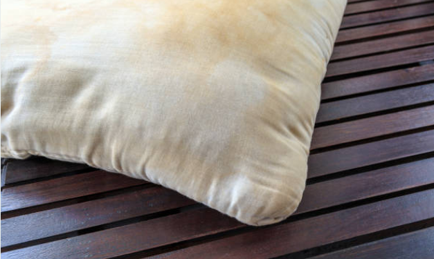 An image showing a dirty pillow which can lead to an ear infection